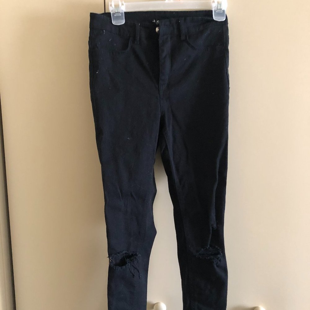 Black jeans with rips